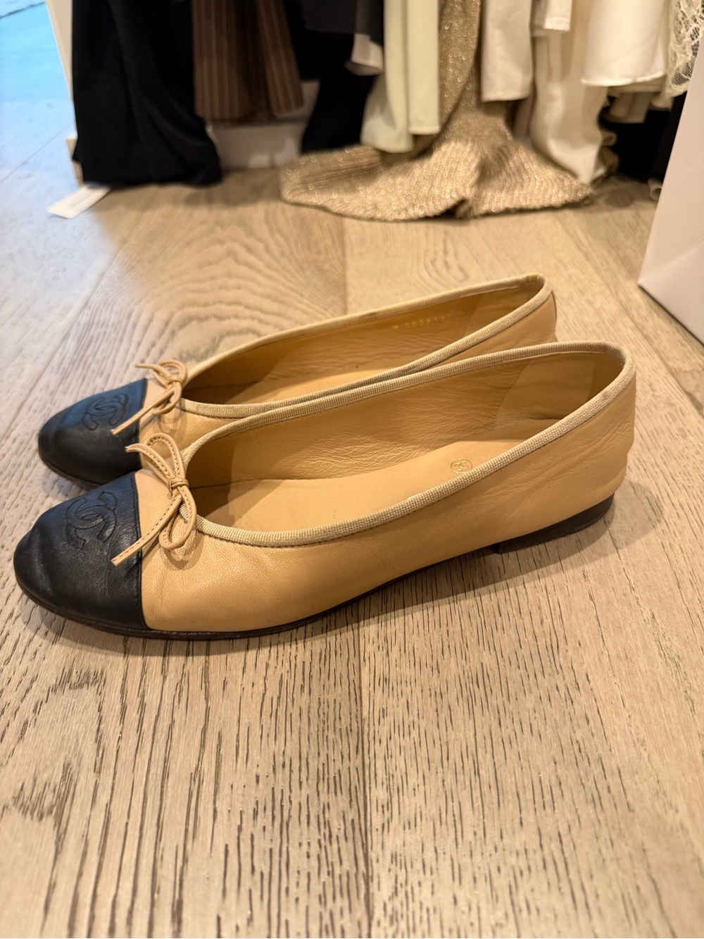 CHANEL Beige Leather Ballet Flats with Black Cap Toe - Picture 2 of 3